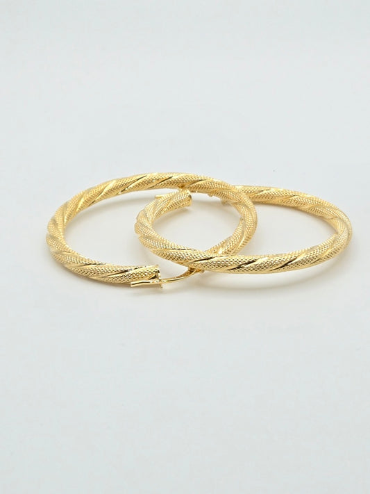 Aretes argollas nevadas torcidas 10k Size 4cm Weight 2.94