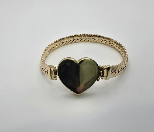 Manilla snake corazon 10k Size 7x6.7 Weight 11.15